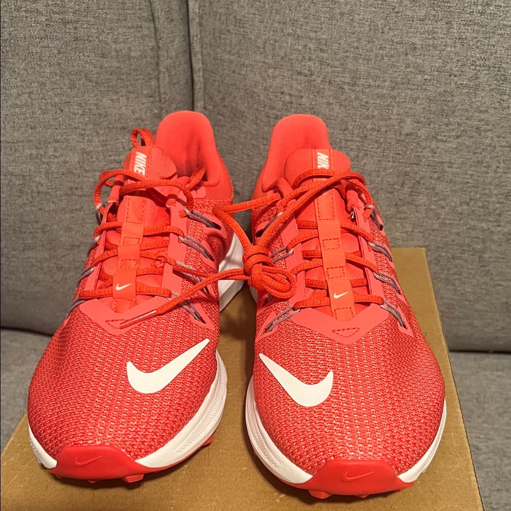 NWT Nike Crimson and White Athletic running Sneakers.